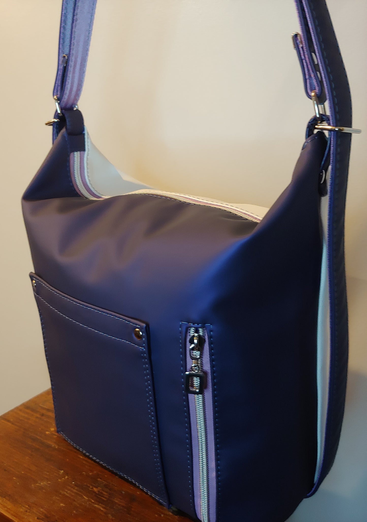 A Convertible Crossbody / Backpack